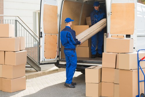 Man and van moving boxes in Camberwell street