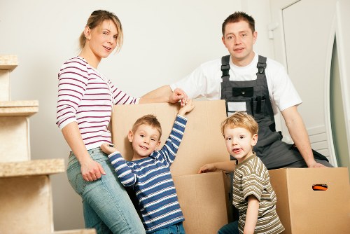 Charity donation boxes and reusable furniture prepared after a Camberwell house move