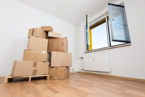 Sustainable removals team recycling cardboard and plastics at the end of a move