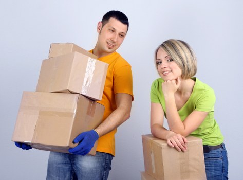 Packing and organizing boxes before a removal truck hire